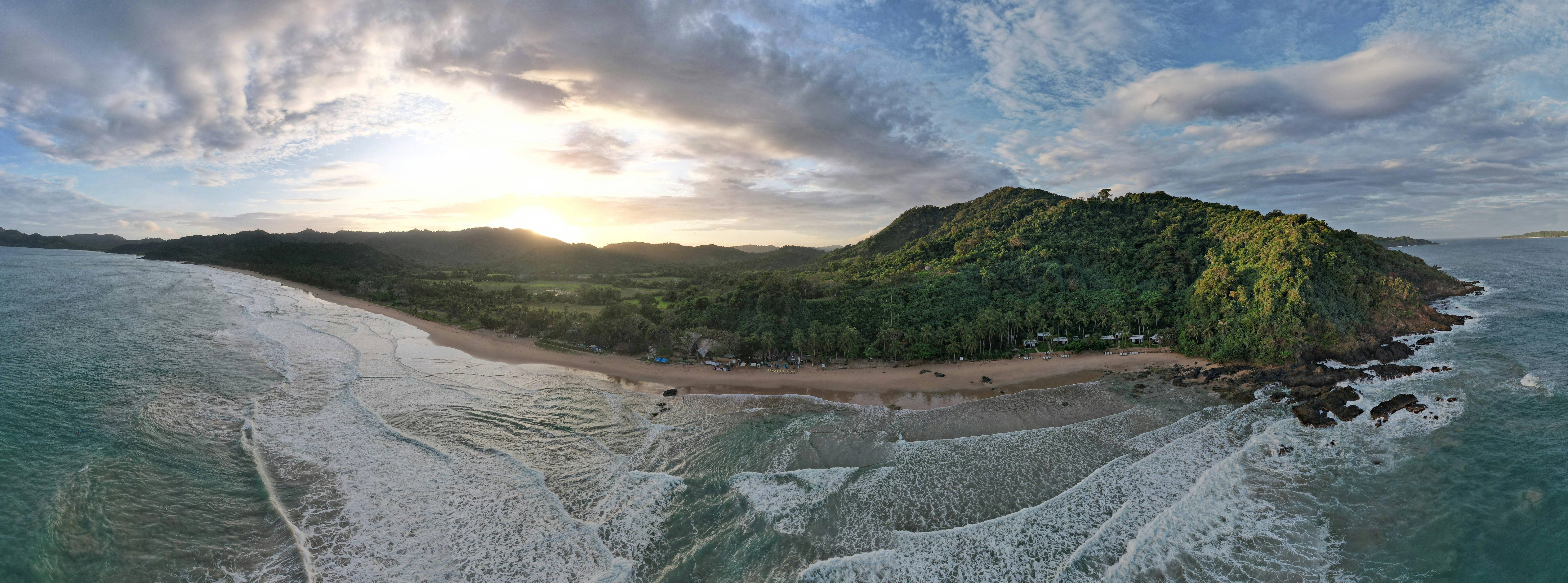 Santa Teresa beach with Pacific waves and lush tropical vegetation Costa Rica